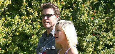 tori-and-husband-showing-baby-bump.jpg