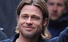 Brad Pitt saluda a sus fans en el set de World War Z