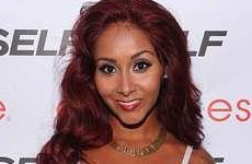 Snooki muestra su delgada figura – perdió 22 kilos!