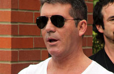 Simon Cowell mencionado en el divorcio de su amigo