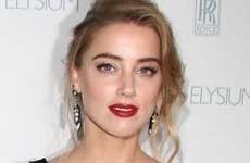 Amber Heard niega chantaje, habla con la policia