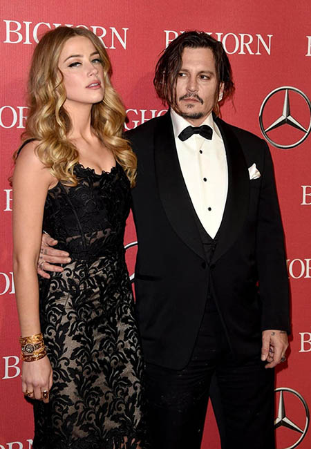 amber heard johnny depp postponed