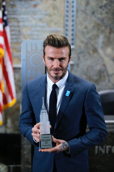 David Beckham Lights Empire Unicef event