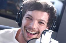 Louis Tomlinson arrestado por atacar a un paparazzo