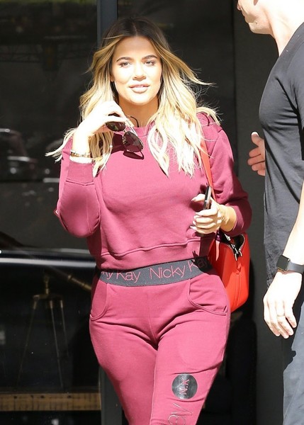 Khloe Kardashian smiles