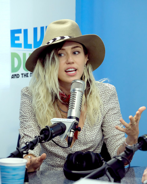 Miley Cyrus Visits Elvis Duran