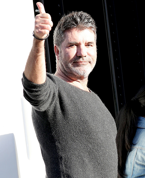 simon cowell home after fall