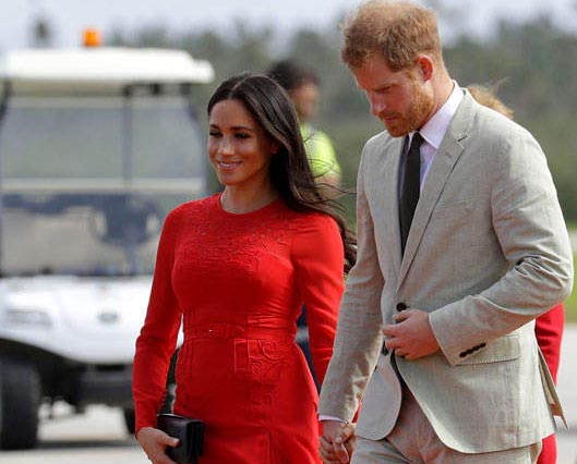 meghan markle prince harry red dress