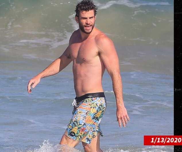 liam hemsworth beach