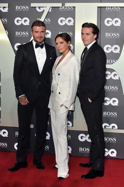 Brooklyn con sus padres David y Victoria Beckham