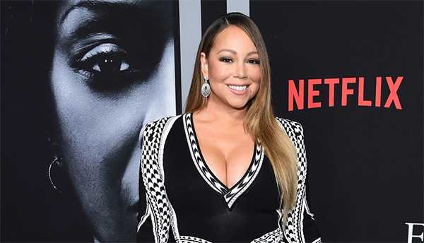 Hermana de Mariah Carey la demandó por su libro